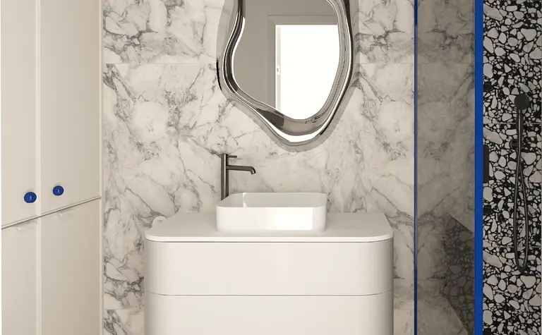 Nowoczesna łazienka z marmurowymi ścianami i elegancką umywalką