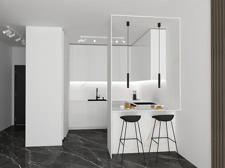 Minimalistyczna kuchnia z białymi meblami i czarnym blatem.