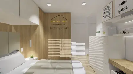 Wnętrze sypialni z minimalistycznym designem, białe meble, drewniana ściana.