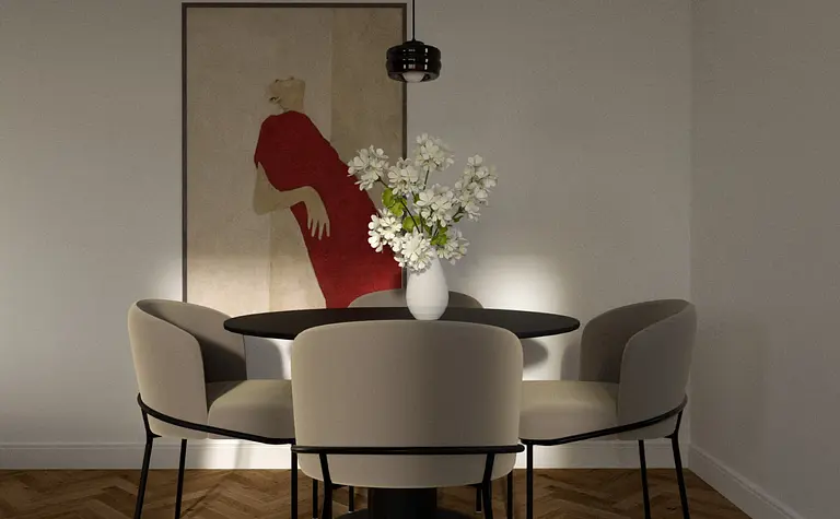 Eklektyczna jadalnia z okrągłym stołem, krzesłami i wazonem z kwiatami.