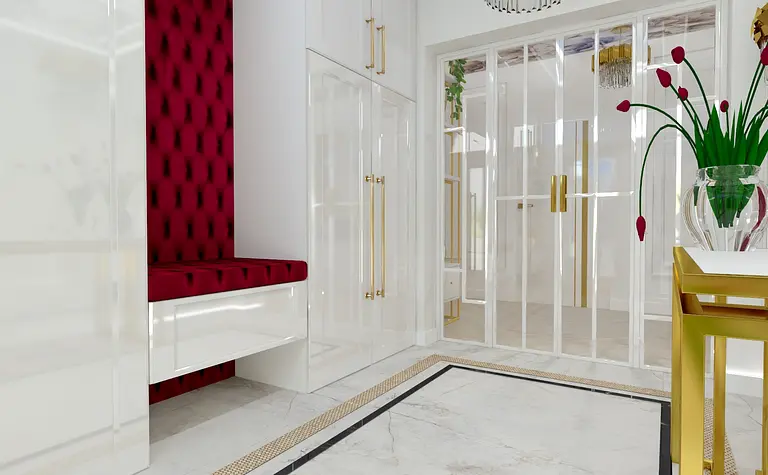 Przedpokój z czerwonymi ścianami, białymi meblami i złotymi akcentami, styl glamour.