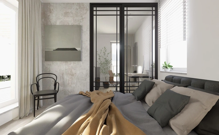 Sypialnia w stylu industrialnym z minimalistycznym łóżkiem i biurkiem.