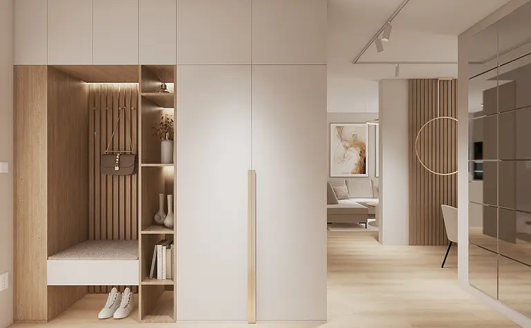 Garderoba w stylu glamour, japandi i minimaluxe z jasnymi meblami i drewnem.
