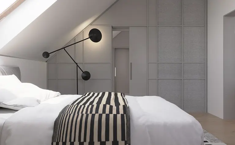 Nowoczesna sypialnia z szarymi ścianami i minimalistycznym oświetleniem w stylu dopamine decor.