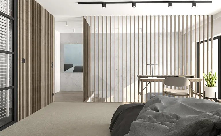Wnętrze w stylu industrialnym i minimalistycznym z drewnianymi detalami i nowoczesnym biurkiem.