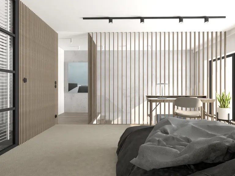 Wnętrze w stylu industrialnym i minimalistycznym z drewnianymi detalami i nowoczesnym biurkiem.