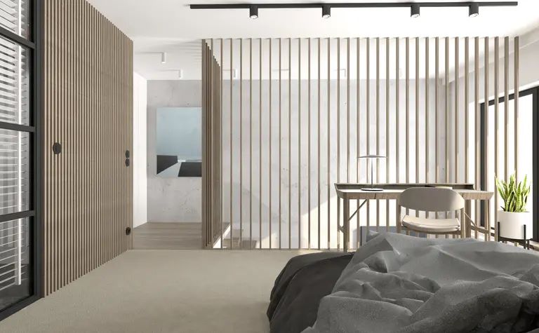 Wnętrze w stylu industrialnym i minimalistycznym z drewnianymi detalami i nowoczesnym biurkiem.
