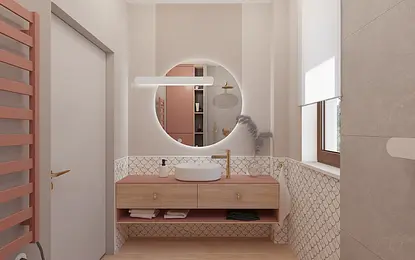 Nowoczesna łazienka z różowym blatem, okrągłym lustrem oraz detalami w stylu art deco i boho.