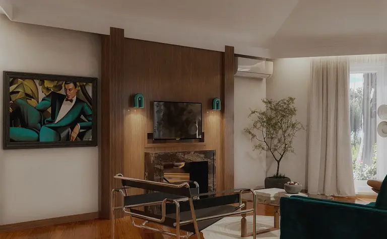 Wnętrze salonu w stylu art deco, quiet luxury, współczesnym z zieloną sofą.