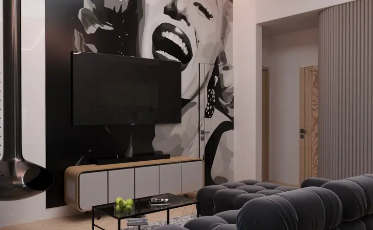 Wnętrze salonu w stylu eklektycznym i minimalistycznym z czarną sofą i muralem.