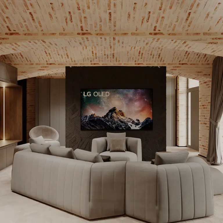 Wnętrze nowoczesnego salonu z jasnymi meblami i telewizorem LG OLED