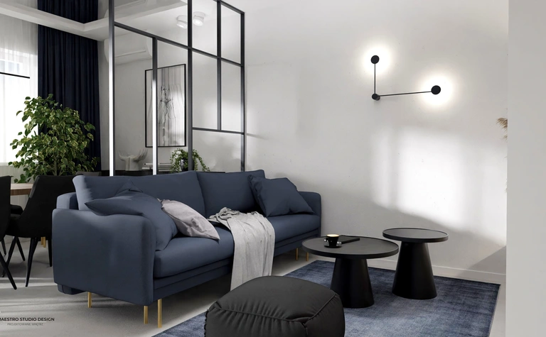 Nowoczesny salon z niebieską sofą, minimalistycznymi meblami i roślinami w stylu industrialnym.