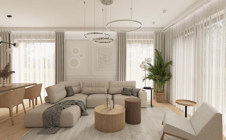 Wnętrze salonu w stylu japandi i minimalistycznym, z jasnymi meblami i roślinami.