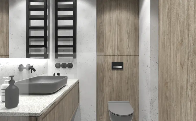 Wnętrze łazienki w stylu industrialnym z drewnianymi meblami i minimalistycznymi detalami.