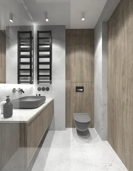 Wnętrze łazienki w stylu industrialnym z drewnianymi meblami i minimalistycznymi detalami.