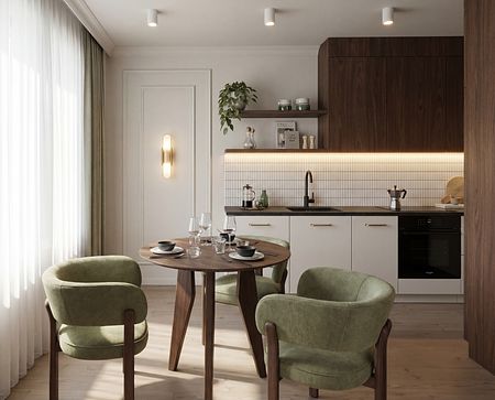 Nowoczesna kuchnia z drewnianymi meblami, zielonymi krzesłami i minimalistycznym oświetleniem