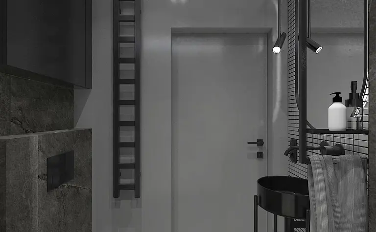 Nowoczesna łazienka z czarnymi i szarymi elementami, industrialny styl.