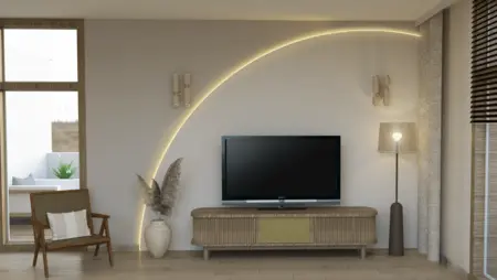 Salon z telewizorem, drewnianym meblem i nowoczesnym oświetleniem w stylu boho.