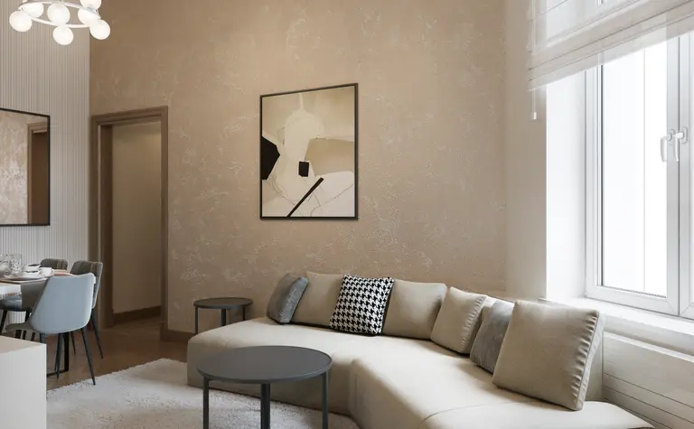 Wnętrze salonu w stylu art deco i glamour z beżową sofą i nowoczesnymi lampami.