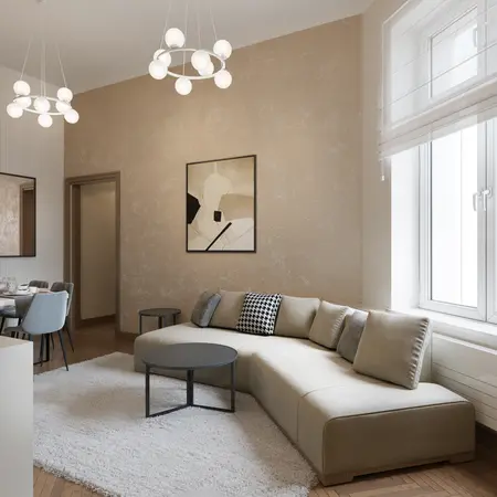 Wnętrze salonu w stylu art deco i glamour z beżową sofą i nowoczesnymi lampami.
