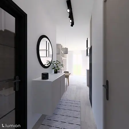 Przedpokój w stylu minimalistycznym z białymi meblami i czarnymi detalami.