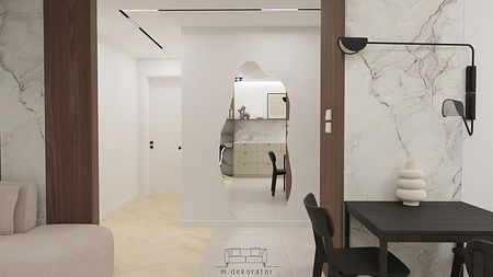 Wnętrze korytarza z minimalistycznym designem, jasne ściany i drewniane elementy.