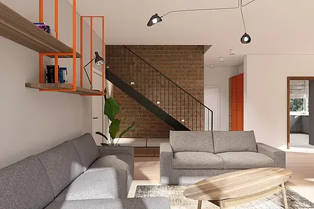Wnętrze salonu z szarymi meblami w stylu minimalistycznym i skandynawskim.