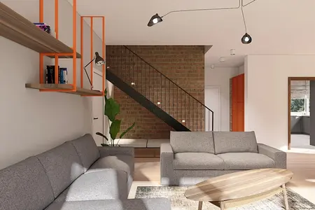 Wnętrze salonu z szarymi meblami w stylu minimalistycznym i skandynawskim.