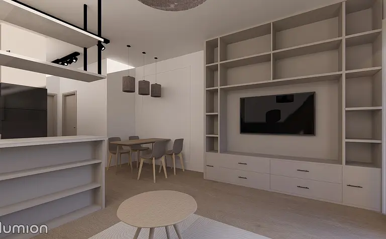 Nowoczesny salon z minimalistycznym wystrojem, jasnymi meblami i drewnianymi detalami.