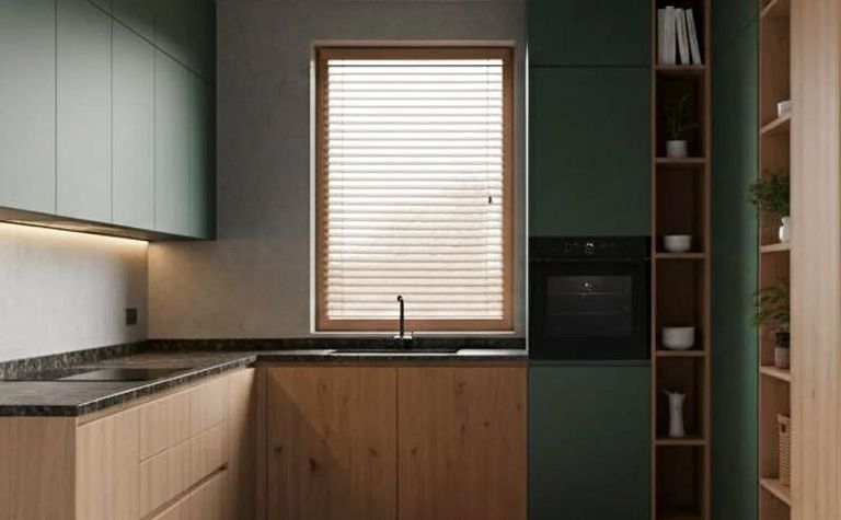 Kuchnia minimalistyczna z nowoczesnymi drewnianymi meblami i współczesnymi akcentami.