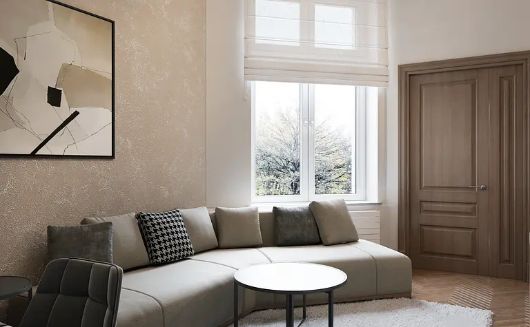 Wnętrze salonu w stylu art deco z kanapą i białym stolikiem.