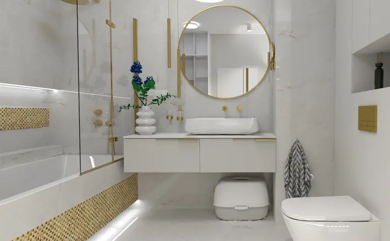 Nowoczesna łazienka w stylu glamour z białą umywalką i złotymi detalami.