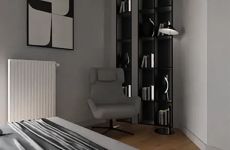 Minimalistyczne wnętrze z szarym fotelem, półkami i białą ścianą