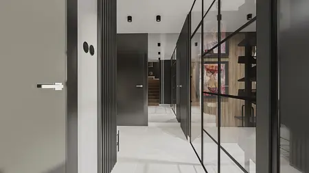 Korytarz w stylu industrialnym z czarnymi elementami i szklanymi ściankami