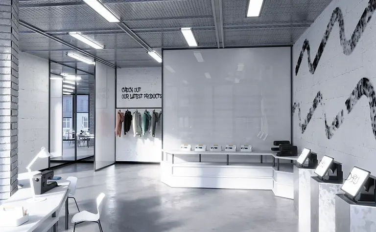 Wnętrze biura z minimalistycznym designem, białymi meblami i nowoczesnym oświetleniem.