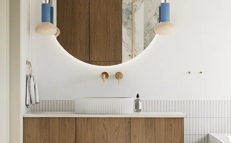 Nowoczesna łazienka w stylu art deco z drewnianą szafką i okrągłym lustrem.