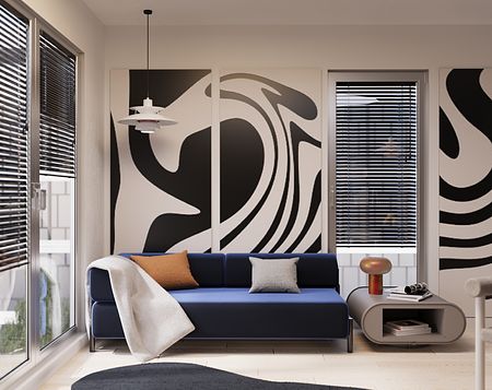 Wnętrze salonu w stylu eklektycznym z minimalistycznymi akcentami, niebieska sofa.