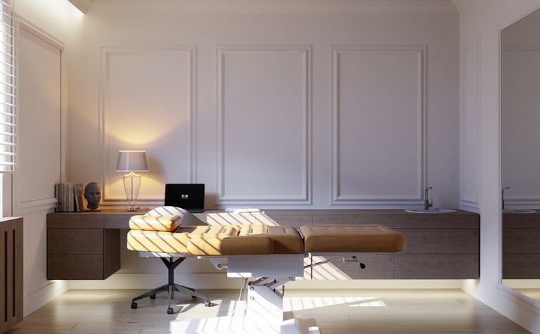 Gabinet w stylu art deco, minimalistycznym z nowoczesnym wyposażeniem.