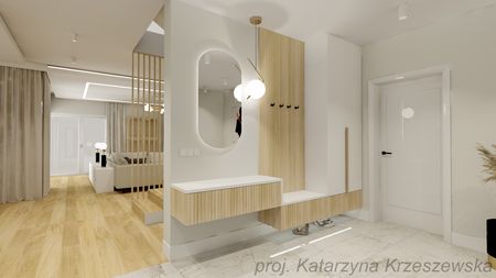 Przedpokój z nowoczesnymi meblami, lustrem i jasnymi akcentami.
