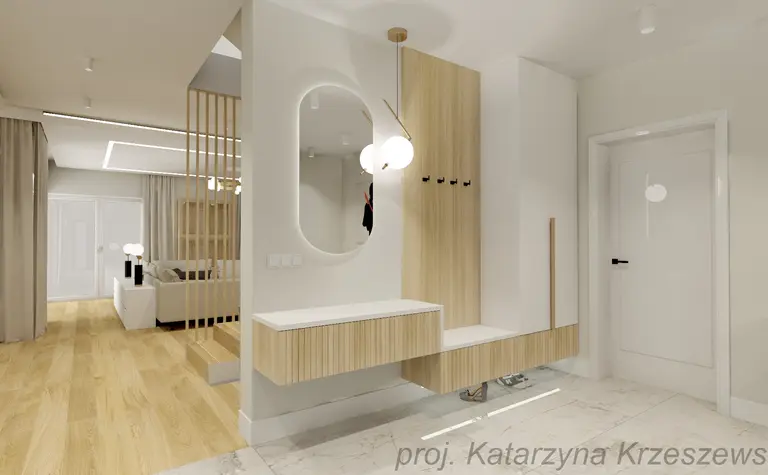 Przedpokój z nowoczesnymi meblami, lustrem i jasnymi akcentami.