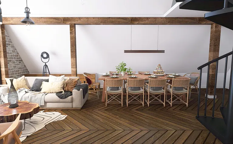 Wnętrze jadalni w stylu industrialnym i nowoczesnym, z drewnianym stołem i komfortowymi krzesłami.