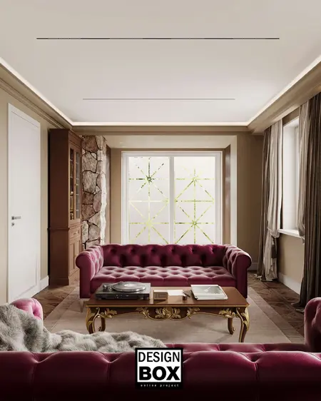 Wnętrze salonu w stylu glamour z burgundowymi sofami i drewnianym stołem.