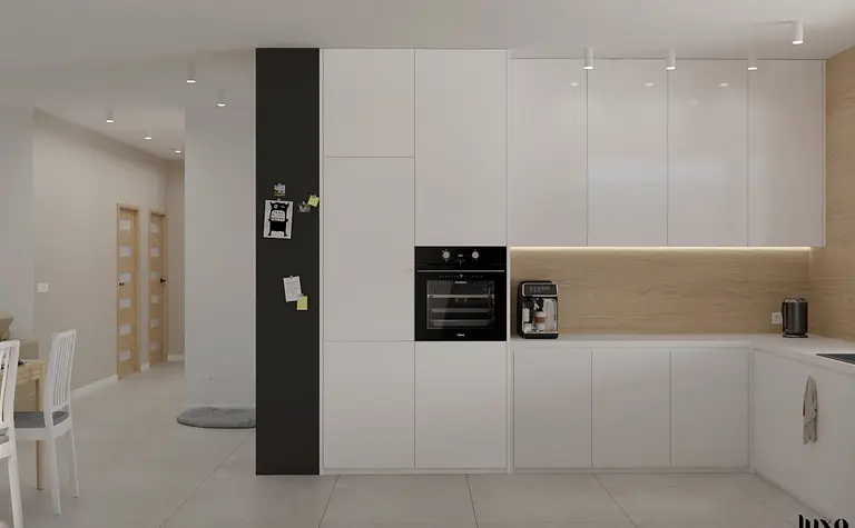 Kuchnia w stylu japandi, minimalistycznym i nowoczesnym z białymi meblami.