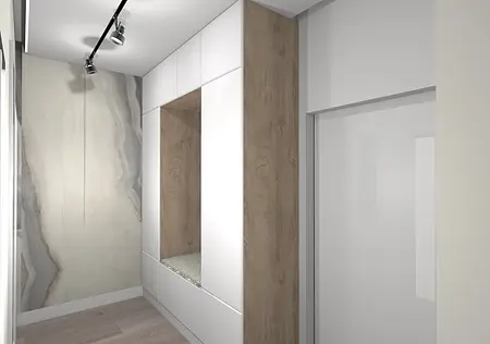 Nowoczesna garderoba z białymi meblami, drewnianymi detalami i minimalistycznym wykończeniem.