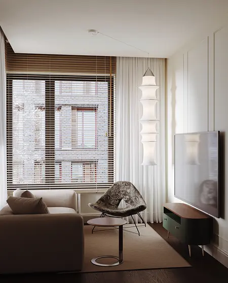 Wnętrze salonu w stylu nowoczesnym i soft minimalizm z jasnym dywanem oraz dużym telewizorem.