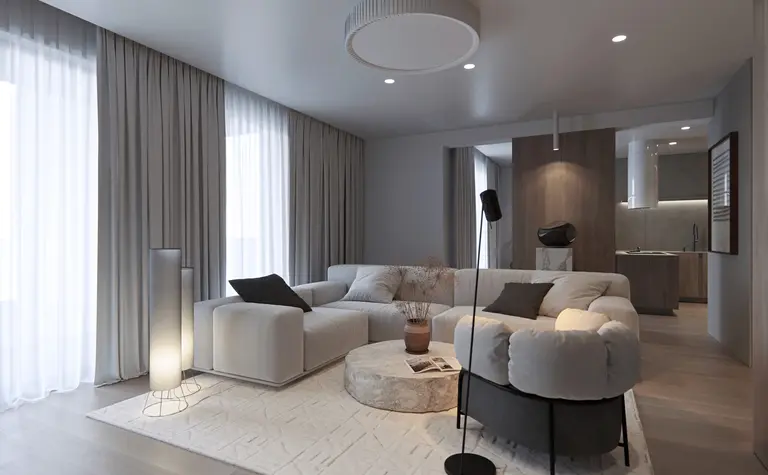 Wnętrze salonu w stylu eklektycznym i minimalistycznym z jasnymi meblami.