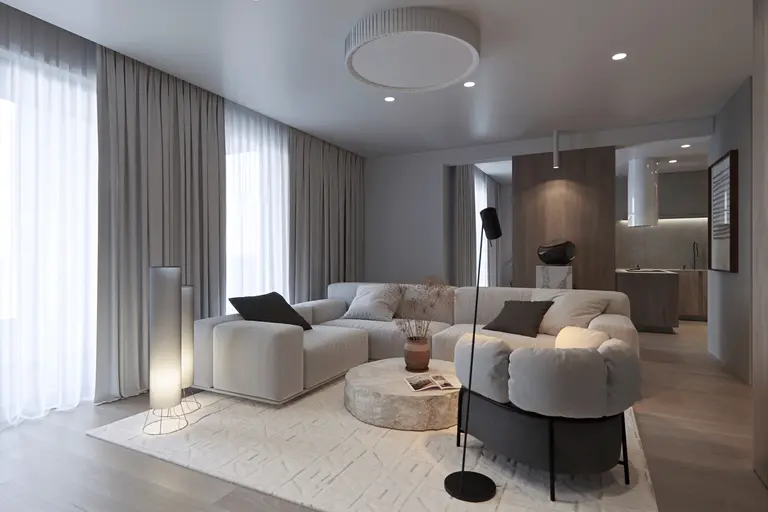 Wnętrze salonu w stylu eklektycznym i minimalistycznym z jasnymi meblami.