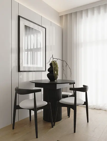 Nowoczesny kącik jadalniany z industrialnymi akcentami i minimalistycznym wystrojem.