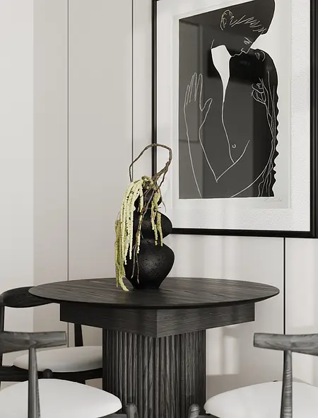 Wnętrze jadalni w stylu industrialnym i japandi z okrągłym stołem oraz czarnymi dodatkami.