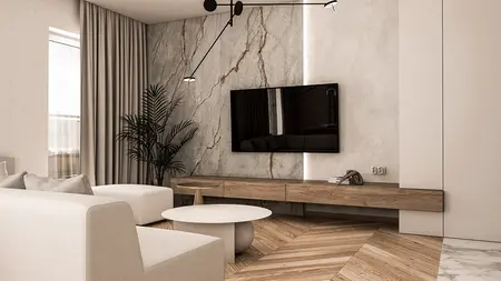 Wnętrze salonu w stylu japandi i soft minimalizm z szarymi ścianami i drewnianymi meblami.